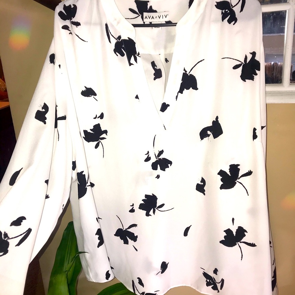 White and black flowered blouse